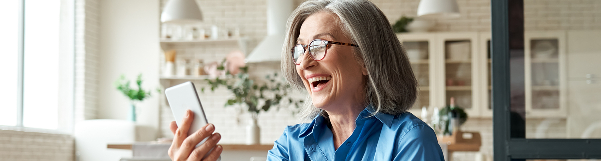 A woman receiving a digital gift on a smartphone