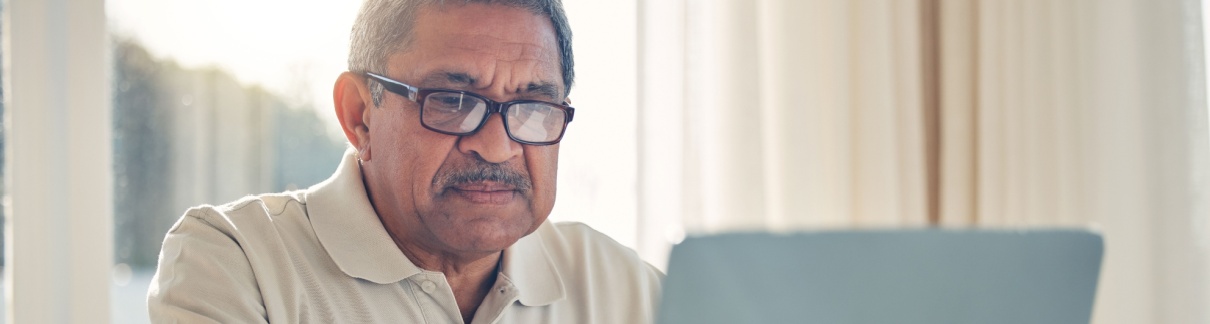 A man using a laptop.