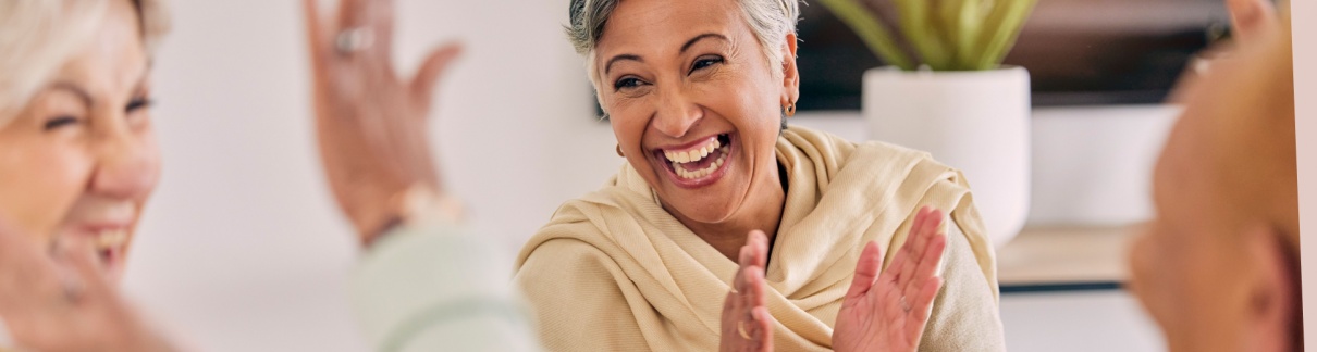 A group of women laughing together.