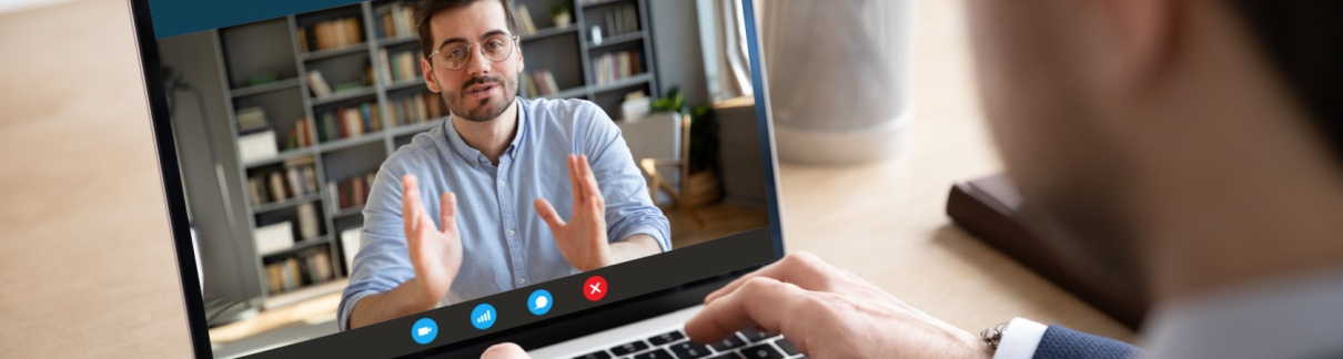 Someone using Zoom to talk to a person.