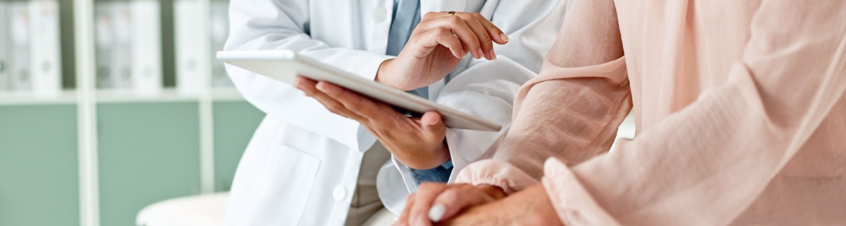 A doctor talking to a patient.
