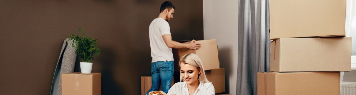 Couple moving boxes