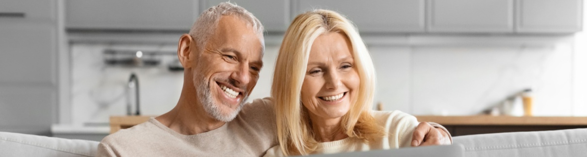 Happy couple shopping online