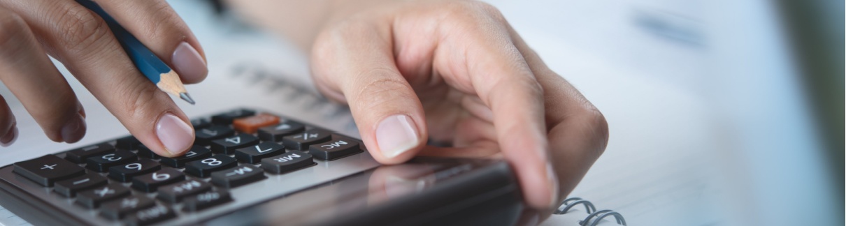 A person using a calculator.