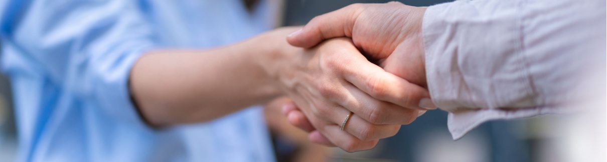 Two people shaking hands
